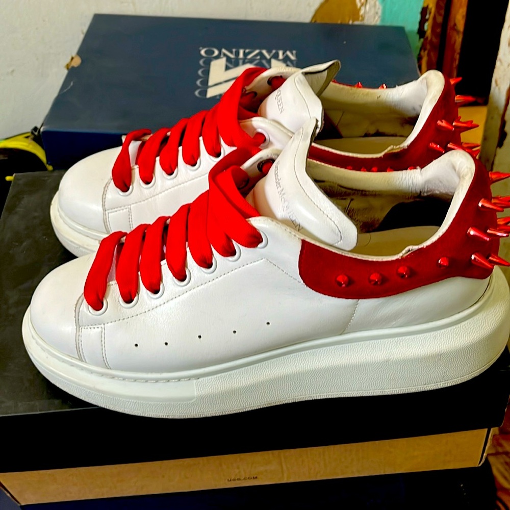 I am selling some white and red spiked Alexander McQueens first come first serve